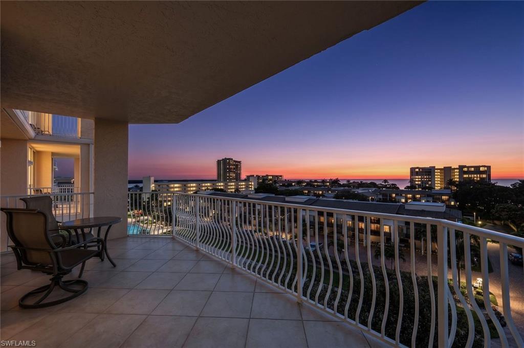 One or more photo(s) has been virtually staged, AI generated or rendered.  Experience elevated island living in this rarely available sixth-floor Courtyard Towers residence, ideally positioned just one level below the penthouse. This spacious turnkey-furnished condominium offers three bedrooms, three full baths, outstanding sunset views, and beautiful Gulf views in one of Marco Island's most desirable locations near the South Beach entrance. A secured elevator opens directly to your private foyer with French door entry, welcoming you into a bright open-concept floor plan designed to capture natural light and breathtaking western exposure. The expansive living room features a wall of windows and flows seamlessly into the dining area and large kitchen complete with breakfast bar, pantry, and abundant cabinetry--ideal for entertaining and everyday living. The spacious primary suite offers private access to the oversized screened lanai measuring approximately 14' x 26', where you can enjoy stunning sunsets and warm Gulf breezes year-round. The luxurious primary bath includes dual vanities, water closet, walk-in shower, and separate his-and-her walk-in closets. The desirable split-bedroom floor plan provides privacy for guests, with both guest bedrooms opening to a south-facing balcony featuring beautiful views overlooking the Gulf and the 10,000 Islands. Bedroom two features a private ensuite bath with dual vanities, walk-in tiled shower, and walk-in closet, while the third full bath also serves as the guest bath. Additional highlights include impact glass, a private one-car garage, large walk-in storage closet within the unit, and a separate laundry/utility room. A thoughtful design places the HVAC system and water heater outside the living space for quieter interior enjoyment. Courtyard Towers offers exceptional resort-style amenities including a geothermal heated pool, clubhouse with fitness center and full kitchen for private gatherings and community events, tiki hut, barbecue grilling area, beautifully illuminated paver walkways, and community boat docks available through a lottery system. Residents also enjoy a common dock area perfect for fishing and waterfront relaxation. Located just steps to the South Beach access and close to popular restaurants, shops, and entertainment, this pet-friendly community allows one pet up to 20 pounds. A truly unique opportunity to enjoy luxury coastal living with spectacular views, outstanding amenities, and an unbeatable island location. Certain photos/videos may include virtual staging or digital enhancements for illustrative purposes.