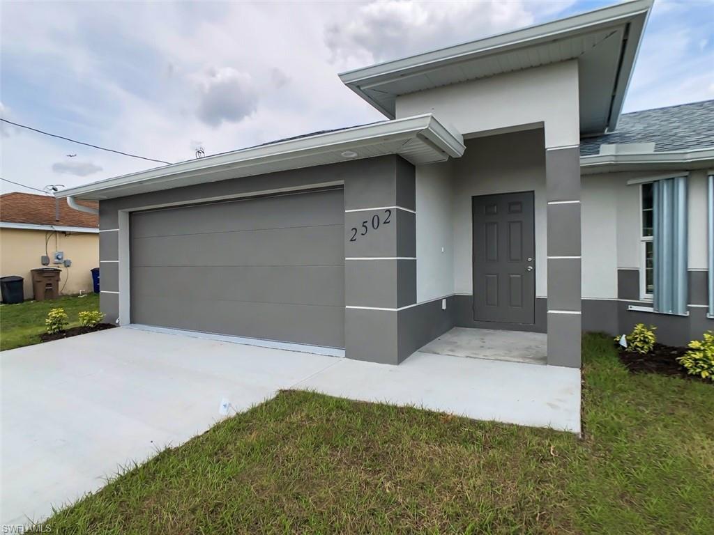 BEAUTIFUL 3/2/2 Contemporary Home! Located in Lehigh Acres right off of Sunshine Blvd and Lee Blvd. From the bay window and modern finishes this home is sure to turn your future house in to a home. This home features tile throughout, wood cabinets, granite counter tops, stainless steel appliances, garage door opener, epoxy garage floor, sprinkler system and more. Don’t miss out on this opportunity to own this gem. This home is under construction and will be completed by March 2020. Images are exactly how the home will be finished. Call today for more details!