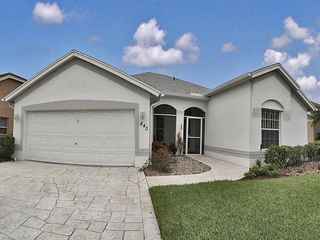 This beautifully maintained home in pristine condition is a must see! This two bedroom plus den two full bath, two car garage home is in move in condition. Exceptional lake view from your screened-in- lanai. Nicely updated guest bathroom with walk- in- shower. New roof in 2018 with 30 years warranty.  Newer Air condition, water heater, dishwasher, refrigerator. Granite kitchen counter. Plantation shutters in den, guest bed room and guest bathroom.
Room for pool! Very low HOA fees only $ 270.00 a year!