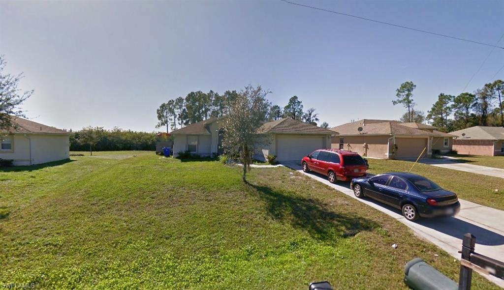 Your looking at a great waterfront 3/2/2 located in the peaceful Greenbriar area of Lehigh Acres. Features vaulted ceilings, solid surface counters, tile and carpet flooring, rain gutters, solid wood cabinets and plant shelves. The seller is currently completing a complete drain field replacement for the septic system as well. Only a few minutes drive to shopping plazas like Winn-Dixie and access to SR-80 and just a short drive to I-75 for travel. Outside the rear sliders you will find plenty of room to add a custom pool, or just enjoy the oversized canal front lot with a tranquil view of a wooded area. Houses are flying off the shelf, call today for your private viewing!