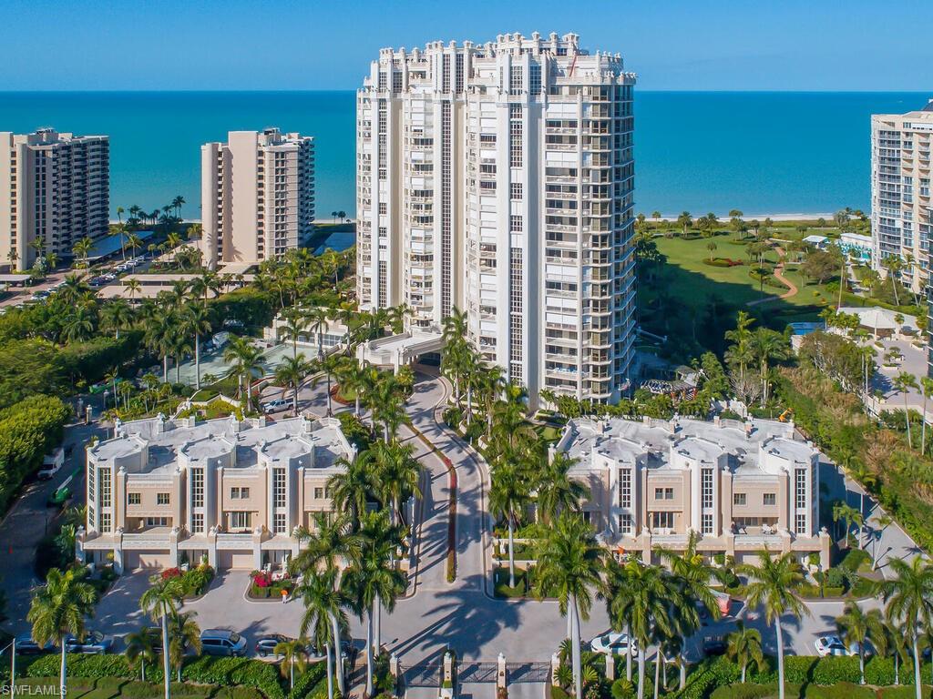 This impeccable beachfront residence captivates with show-stopping Gulf views and a beautiful interior featuring appealing and thoughtful renovations.  All of this was envisioned by award-winning Joy Tribout Interior Design, of St. Louis, Illinois, and Naples; this coastal residence reflects her signature blend of sophistication, warmth and timeless elegance.  
Offered fully furnished, this light-filled beach retreat encompasses 3,050 sq. ft. under air, and just under 4,000 total sq. ft., including two expansive lanais incorporating the outdoors in true Naples style.
Completely reimagined and updated, the floor plan includes four bedrooms, 3.5 bathrooms, two generous and serene lanais, plus 2 dedicated under-building parking spaces.  The Brittany is also pet friendly, welcoming your four-legged family member to Naples.  
The expanded kitchen, now seamlessly integrated with the dining & family spaces, creates an inviting place to gather for morning coffee, sunset cocktails, and every moment in between.
The primary suite and one guest bedroom enjoy dazzling and direct Gulf views; and, two additional en suite bedrooms share access to a spacious lanai, featuring a peaceful spot to read, reflect, or relax.  In the primary bath, the soaking tub may also become a favorite spot to unwind, with glorious sun-soaked views over a park and the Gulf waters beyond.
Residents of the Brittany enjoy a spacious sunny beachside pool, suitable for laps.  A grilling pavilion is nearby and a well-appointed fitness center are some of the amenities residents and their visitors will enjoy.  There are guest suites if extra space is needed for family & friends you are sure to welcome.  This is a secure, gated building with a 24-hour doorman.  
Perfectly positioned along Park Shore Beach, this residence overlooks one of the expansive green spaces alongside a beach pathway equally suited to power walks or sea strolls.  And, the popular Venetian Village is across the street, offering waterfront dining & boutique shopping.  The vibrant offerings of Fifth Ave. S. & historic Third St. S. are close by as well.  Come home this season to The Brittany 403!