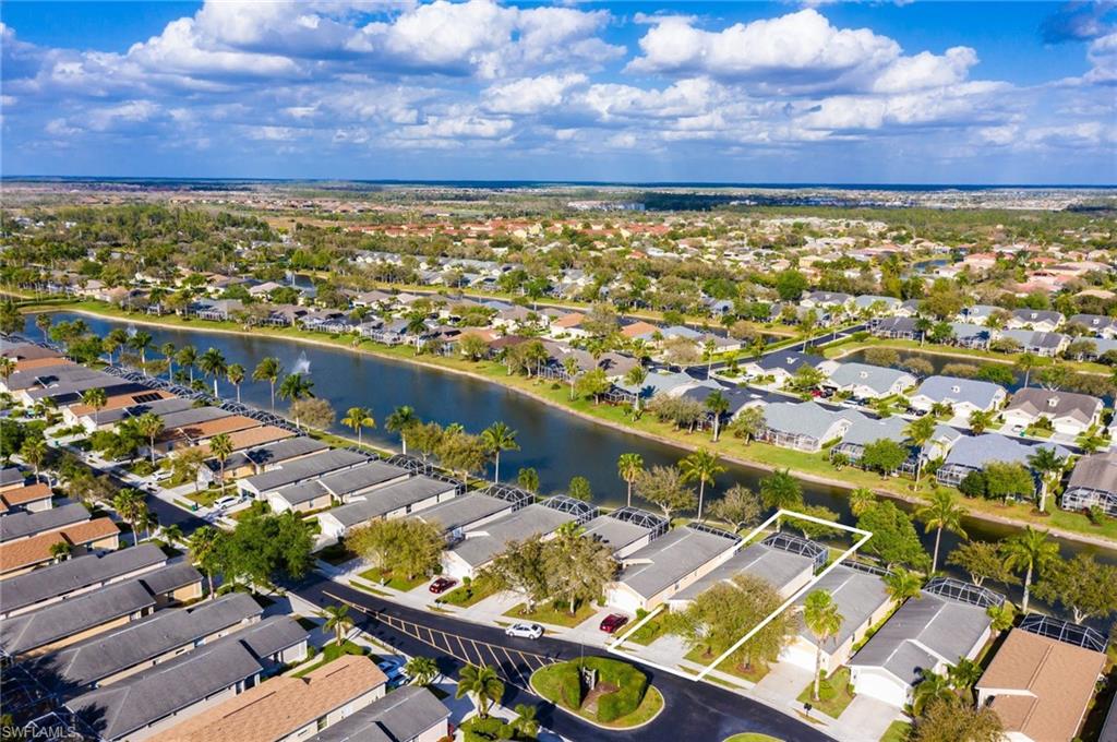 Back on the market.. Buyer's financing fell through.  Prime Location!!! Welcome to Ibis Cove, one of Naples most desired communities in North Naples. This wonderful Updated Single Family Pool Home  features a vast lake view, nearly 1,600 Sq. Ft of living space, 3  Bedrooms, 2 Bathrooms, 2 car garage. Freshly painted inside, Vaulted ceilings,  Renovated kitchen with Quartz,  stainless steel appliances, new glass back plash, newer washer and dryer, newer AC system, newer light fixtures, excellent natural light. Spacious Master Bedroom, master bath has dual sinks, large walk-in-shower, large tub, and 2 walk-in closets, diagonal tile  in all  living areas and laminated flooring in bedrooms. Step out through the sliders  from the great room to the overextended screened lanai and heated pool with peaceful and vast views of  the lake. Rated A schools. Low HOA fees! Recently updated clubhouse with billiard room, library, fitness center and entertaining facilities. Resort style pool and spa, playground and two tennis courts. Fees include lawn maintenance, cable, internet and more. Easy access to I-75, restaurants, shopping  and only six miles to the Beach!