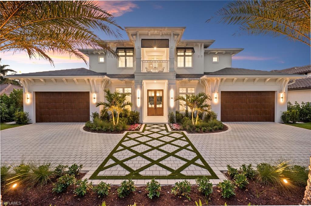 A rare opportunity to own a newly completed waterfront masterpiece in the prestigious Moorings, offering highly coveted western exposure and breathtaking Naples sunsets. Perfectly positioned along the Moorings Golf & Country Club and just moments from the beach, this exceptional residence combines timeless architecture, sophisticated European design, and effortless coastal living.

Thoughtfully designed by European couple Teresa and Lukas Krapf-Dobr, beautifully furnished by Clive Daniel Home, and expertly crafted by Wilder Builders, this move-in ready home showcases uncompromising quality, exquisite craftsmanship, and seamless indoor-outdoor living.

Encompassing more than 7,200 square feet, the residence features five luxurious en-suite bedrooms, including a spectacular first-floor primary suite and an additional first-floor VIP guest suite. A private office can easily serve as a sixth bedroom. The gourmet European-inspired kitchen is equipped with premium Miele and Sub-Zero appliances, a hidden walk-in pantry, built-in coffee system, double ovens, two dishwashers, and dual wine refrigerators. Additional highlights include a four-car garage, elevator, mudroom, upstairs laundry, whole-house generator with a 500-gallon propane tank, Lutron lighting, Sonos sound system, custom closets, and elegant white European oak flooring accented with shell stone inlays and refined custom millwork.

Designed for year-round entertaining, the expansive outdoor living area offers a covered lanai with a fireplace, outdoor kitchen, bar, spacious dining and lounge areas, retractable screens and shutters, a stunning resort-style pool and spa, and a built-in gas fire pit overlooking tranquil lake and golf course views.

Offering both luxury and peace of mind, the home is located in the desirable X500 flood zone and features an impressive finished floor elevation of 11.4 feet, providing exceptional protection.

Private membership to the Moorings Beach Park is available, placing pristine Gulf beaches just minutes away. Enjoy close proximity to Naples' finest dining, upscale shopping, and world-class entertainment in one of the city's most sought-after waterfront communities.