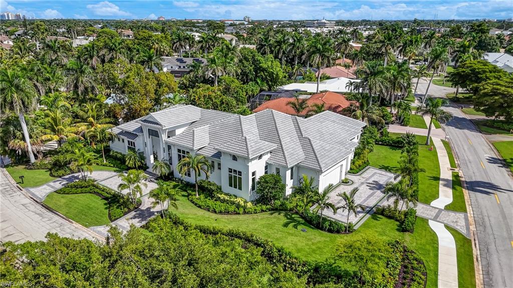 Experience modern luxury in this brand-new Park Shore estate built by renowned Borelli Construction. Ideally situated near Park Shore’s private beach park, this elevated residence meets current FEMA requirements for the home and all mechanicals.