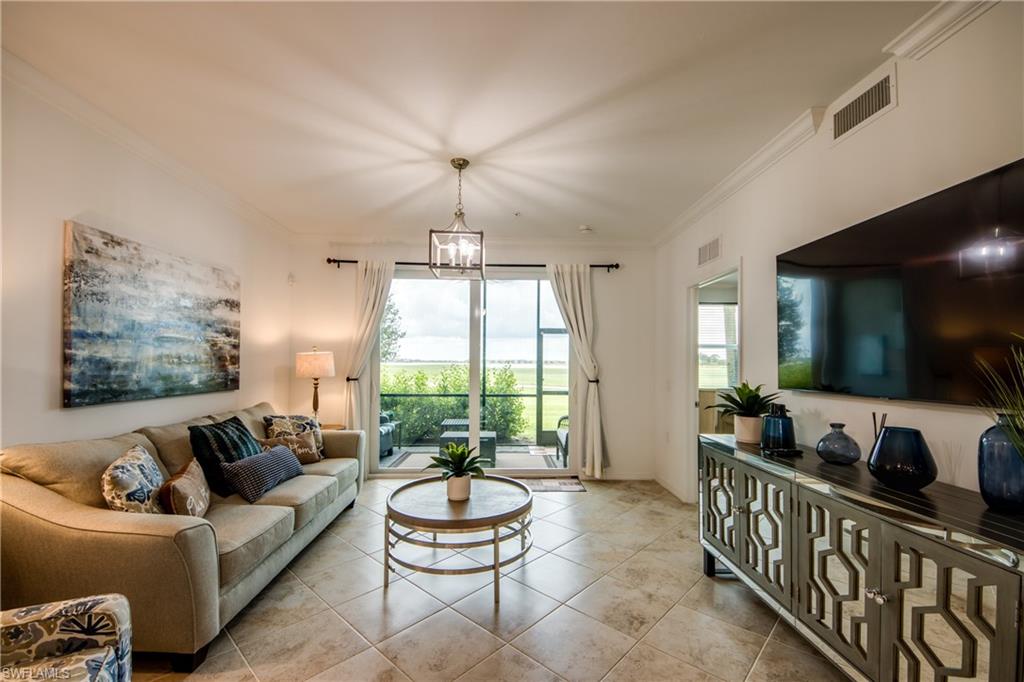 Gorgeous first floor Villa in wonderful Babcock National, lake and golf course views.  Golf Club Membership available.  Screened lanai, granite countertops, stainless steel appliances, crown moldings and washer/dryer inside of Villa.  Separate storage unit across from Condo.  Covered parking and one assigned spot.  Great community with plenty of amenities.