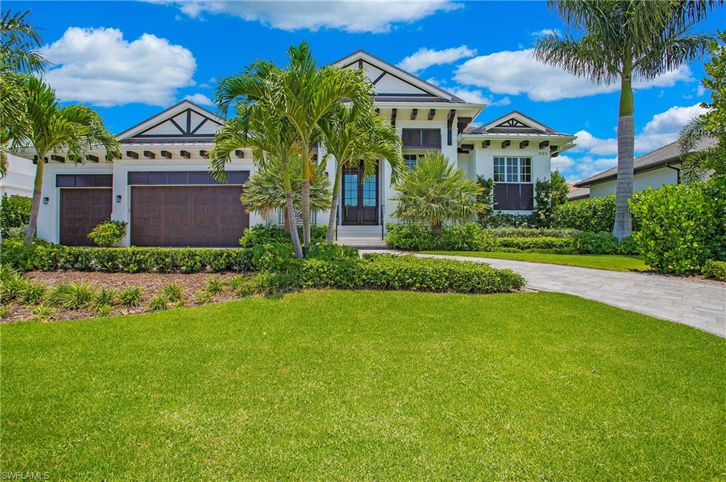 Spectacular home full of sophisticated details, located in highly desirable Park Shore! This 4 bed/3.5 bath home boasts a fabulous great room, outdoor kitchen, coffee bar, wine bar, hidden pantry, TWO master suites, Sonos multi-room wireless speaker system, gas firepit, smart toilets, whole home security system with cameras, and much more. Elegant details including Calcutta marble waterfall countertops and backsplash, Wolf/SubZero appliances, custom coffered ceilings throughout the home, and retractable lanai screens are sure to please the most discerning of tastes. Store up to 6 cars with the addition of a lift in the 3 car-garage. With a location in one of the most beautiful areas of Naples, on a palm tree lined street just steps away from Venetian Village, world -class dining, shopping, entertainment and private white-sand Gulf beach access for Park Shore residents, you can enjoy the best SW Florida coastal living has to offer.