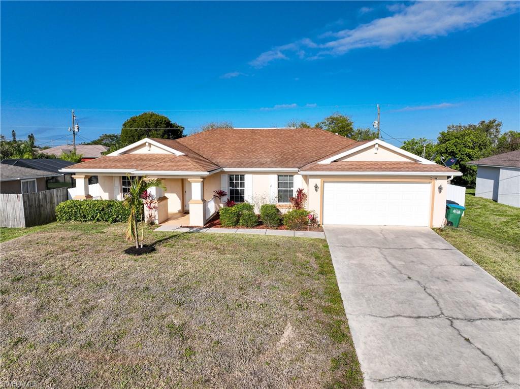 CHARMING 3 Bed, 2 Bath + a DEN/STUDY, 2 Car Attached Garage Home! PARTIALLY FURNISHED. UPDATED LAMINATE WOOD FLOORS, UPDATED MASTER BATH w/WALK-IN SHOWER & DUAL HEADS, 6' VINYL PRIVACY FENCE, PRIVATE WELL IRRIGATION SYSTEM W/RAIN BIRD TIMERS. CLICK ON THE VIRTUAL TOUR LINK 1 FOR A 3D INTERACTIVE WALK THROUGH AND VIRTUAL LINK 2 FOR THE VIDEO. This home features a BRIGHT & AIRY open floor plan, w/a SPACIOUS living room, VAULTED CEILINGS, plenty of natural light, & a seamless flow into the dining & kitchen area. French Doors leads you into the conveniently located Office/Study. The kitchen offers ALL STAINLESS STEEL APPLIANCES INCLUDED, nice amount of counter space, & a BREAKFAST BAR. The Master Bedroom is a fantastic size w/ a GORGEOUS updated Master Bathroom w/ a walk-in shower, DUAL SHOWER HEADS, dual sinks & GRANITE COUNTERTOPS. The additional bedrooms are on a SPLIT FLOOR PLAN & are connected with jack & jill bathroom.  Step out a set of sliding glass doors into the screened lanai w/ceiling fan, perfect to enjoy the beautiful Florida weather & morning coffee!  Host evening BBQ's in the LARGE backyard w/nice 6 foot white vinyl PRIVACY FENCED BACKYARD! SCHEDULE YOUR SHOWING TODAY!