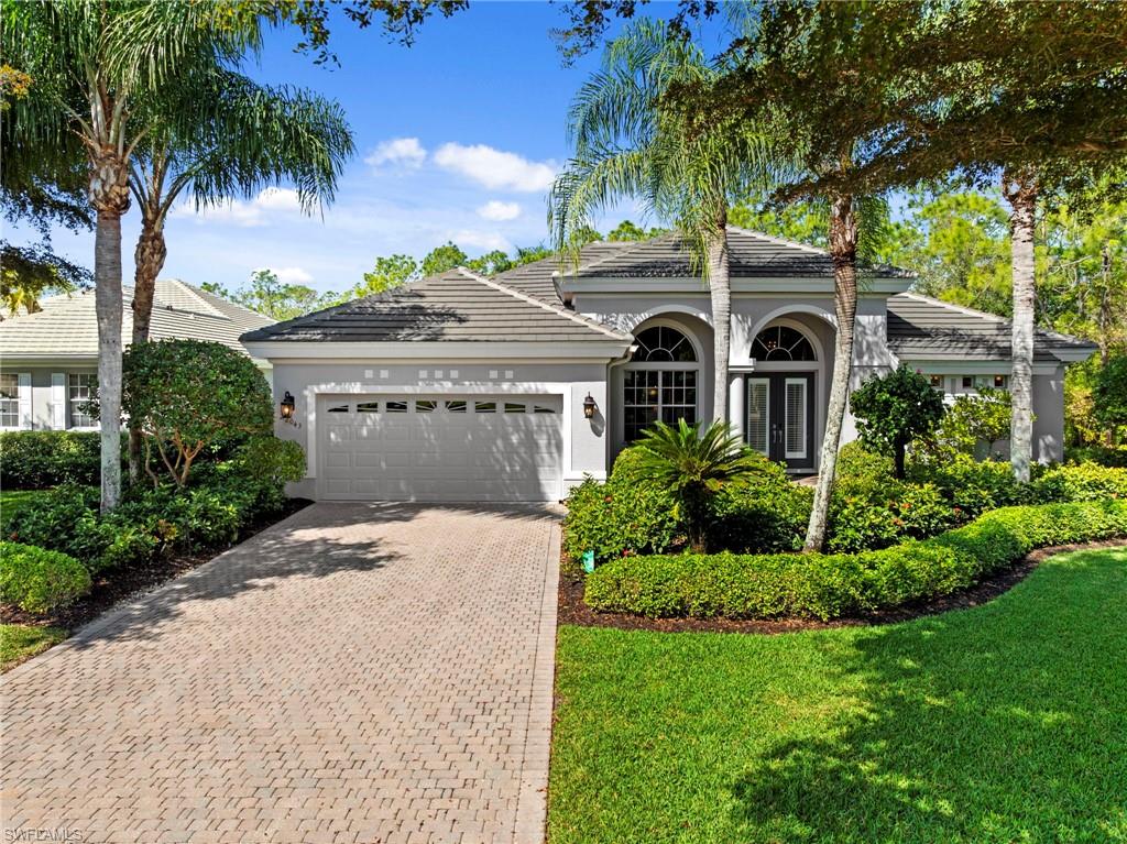 Nestled within the highly desirable Sycamore Grove neighborhood of Shadow Wood at The Brooks, this impeccably maintained 4-bedroom, 3-bath residence offers a rare blend of comfort and privacy. Surrounded by lush preserve views, the home provides a serene, secluded retreat. This property is being offered turnkey, presenting a seamless opportunity to enjoy refined living in one of Southwest Florida’s most sought-after communities. Designed for both comfortable living and effortless entertaining, the home features tile flooring throughout the main living areas and warm wood flooring in three of the guest bedrooms. Expansive pocketing sliding glass doors fully recess into the wall, creating seamless indoor-outdoor living and opening to the oversized lanai while showcasing tranquil preserve views. The newly updated kitchen is thoughtfully appointed with new quartz countertops, abundant cabinetry, and a built-in wine cooler. The adjoining family room features custom built-ins that add both ambiance and practical storage. Step outside to your expansive lanai — a true extension of the home — featuring a large heated pool and spa with both gas and solar heating for efficient, year-round enjoyment. The desirable northwest rear exposure allows you to capture breathtaking Southwest Florida sunsets, casting warm evening light across the pool and outdoor living space. With preserve views and no direct rear neighbors, the setting offers an ideal balance of privacy and beauty. The spacious primary suite serves as a serene retreat with private lanai access, two walk-in closets, and a well-appointed bath complete with dual vanities, a soaking tub, and a generous walk-in shower. Blending privacy, thoughtful upgrades, sunset exposure, and effortless indoor-outdoor design, 22043 Sycamore Grove offers an exceptional lifestyle opportunity within the sought-after Shadow Wood at The Brooks community.
