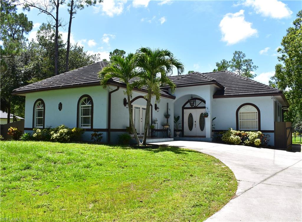 Find your perfect home in one of the most desirable areas of Golden Gate Estates in beautiful Naples, FL! This move-in-ready residence, built in 2007, features 4 bedrooms, 3 bathrooms, a spacious open floor plan, a formal living room with elegant columns, and a dining area that flows seamlessly into the main living space. A private guest suite with its own kitchen, bathroom, and walk-in closet provides the ideal setup for extended family or visitors. The home boasts numerous upgrades, including a tile roof, A/C system, and fencing replaced in 2018, along with 24x24 tile flooring throughout, stainless steel appliances, granite countertops, a dedicated laundry room, and an oversized primary suite featuring dual sinks, a walk-in shower, and a bidet. Enjoy outdoor living with a welcoming front porch, a porch off the kitchen, and a spacious lanai. Additional highlights include hurricane shutters, a concrete driveway, rear access for parking work trucks, RVs, or boats, and a location in a non-flood zone where flood insurance is not required. Situated on a clean, open lot perfect for nature lovers, this property offers the perfect blend of comfort, functionality, and Florida living. Don't miss the opportunity to own this beautiful piece of paradise!