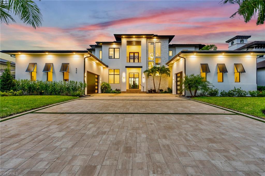 Welcome to 846 Cypress Lake Circle. Completed in 2025 and built to a standard rarely seen in Southwest Florida, this Town and River estate was engineered to outlast and outperform for generations to come. Full CBS construction on both levels, poured concrete floors upstairs and down, a standing-seam metal roof, and impact-rated PGT windows and doors throughout mean peace of mind through every season—and a level of solidness felt the moment you walk in the door. Inside, more than 4,700 square feet of living space unfolds across 4 large bedrooms, an office, 5 full bathrooms, an expansive laundry room, and an oversized 3-car garage with plenty of height for car lifts. With soaring 20’ tall ceilings the scale is generous without ever feeling impractical; this is a home that lives as comfortably for a quiet evening as it does for a houseful of guests. Additional build features include high end GE monogram appliances, an elevator, a motorized chandelier lift, level 5 drywall finish throughout, solid wood cabinetry and trim, top of the line tile work, a heated and automated salt water infinity pool & spa, a 500-gallon buried LP tank, a temperature-controlled wine room, Icynene attic insulation, whole home AC filtration, Synergy wood tongue and groove soffits, smooth sand finish stucco on the outside, a brand new oversized dock, a high end outdoor kitchen with ventilation, a grill, side burner, and refrigerator, and so much more. Yet with all of these features, the setting may be the rarest part of all. Positioned on one of Town and River's most coveted lots, the home enjoys southern exposure over long canal views with all-day sunlight and water as your backdrop. Deep-water direct Gulf access less than 350 yards to the Caloosahatchee River means there's room for nearly any vessel you can imagine, right in your own backyard. And the location delivers the full Southwest Florida lifestyle: minutes from Sanibel Island, Fort Myers Beach, numerous luxury shopping & dining options, the best schools in our area, and so much more. Homes built and positioned like this don't come along often. Schedule your private showing today.