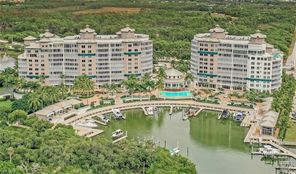 Leave your worries behind and enter the relaxing, low key, amenity rich enclave of Aqua at Pelican Isle.
This lovely 3 bedroom, 3.5 bath condominium offers 3940 square feet of living space plus an additional 400 square foot, 1 bedroom, 1 bath Cabana.  Enjoy the Gulf of Mexico/Bay views to the west and to the east the new Kinsale Golf Course. Fresh paint compliments the wood flooring throughout the living areas and provides a crisp neutral palette for your interior design ideas. The bedrooms have brand new neutral color carpeting, the kitchen boasts fine cabinetry with quartz tops and top end appliances, and the bathrooms are spacious and tastefully done. Amenities within the building are exceptional and too numerous to mention here. Aqua at Pelican Isle needs to be seen to genuinely appreciate all it has to offer.