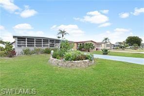 Amazing opportunity in well-established Naples community! Being sold TURNKEY, this meticulously maintained home offering over 1,100 square feet of living space is perfect for seasonal or year-round Florida living. Having a great room design and an open concept kitchen along with two sets of large sliders to the Florida room, give the home a spacious feel with comfortable living spaces. The Florida room that spans the entire width of the home has wall-to-wall windows. A cottage styled kitchen overlooks the great room offering a long island with breakfast bar & tons of cabinetry. New roof, 1/2018 and insulation with a R Factor of 13 was installed, giving the home maximum energy efficiency, a/c unit about 4yrs old. Riviera is an active 55+ community that offers Pickleball, Card Games, Mahjong, Pocket Billiards, Bocce Ball, Shuffleboard, Line dancing, exercise groups, book club, planned trips around South Florida, monthly dances, a men's club and more. Plus a fun Tiki hut, community pool, community room with kitchen & library and YOU EVEN OWN THE LAND!
