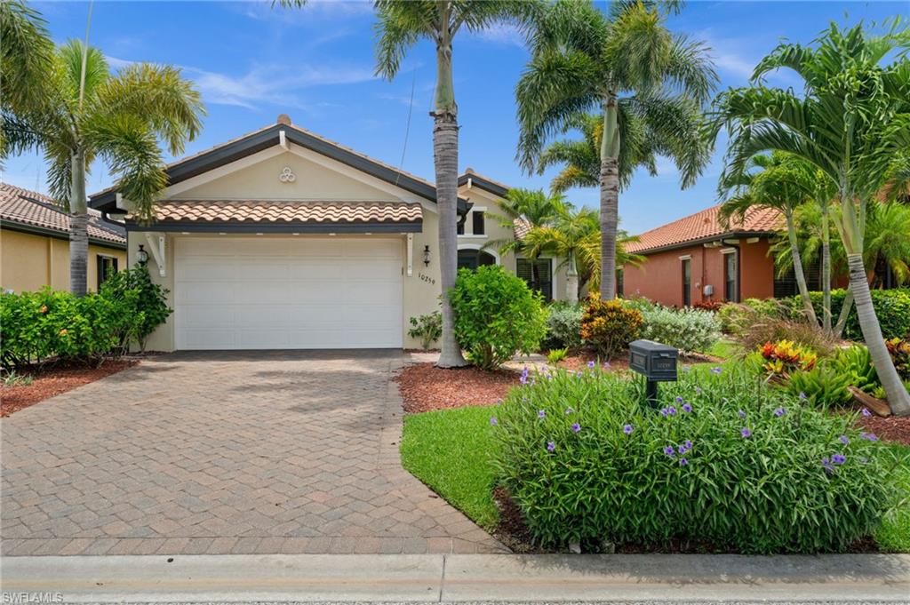 Welcome to your private tropical oasis in Hampton Park, one of Gateway’s most desirable gated communities. Built by a premier Southwest Florida builder and beautifully maintained, this home is surrounded by lush landscaping and mature tropical plantings, with a spectacular southern lake view.

Arched openings add architectural character and draw your attention through the open living area to the expansive lanai, pool, spa and sparkling lake beyond. The spacious kitchen features granite countertops, a large gathering island and abundant storage, while tray ceilings, crown molding, plantation shutters and easy-care flooring add warmth throughout the home. A wall of sliding glass doors creates a seamless connection to the oversized covered lanai and recently updated pool enclosure, featuring a dramatic picture-window screen that 
beautifully frames your lake view.

More than $40,000 in recent improvements and maintenance include hurricane-resistant sliding glass doors, roof improvements, updated pool screening, cleaned and sealed pavers, lighting, ceiling fans and interior enhancements. Remote-controlled lanai hurricane screens provide added peace of mind, while major system updates include the HVAC, water heater and pool pump.

Hampton Park residents enjoy a 24-hour staffed guard gate, clubhouse, fitness center, resort-style community pool, pickleball and basketball courts, playground and additional recreational amenities. Conveniently located near shopping, dining, I-75 and Southwest Florida International Airport, this exceptional home offers comfort, privacy and the Southwest Florida lifestyle you have been waiting for.