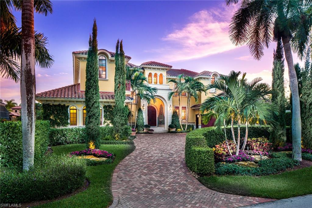 This stunning Aqualane Shores home, professionally designed by Simonsen-Hickok Interiors, offers six bedrooms, seven-and-a-half baths, large lap pool, outdoor gathering area, summer kitchen, sought-after southern exposure, and is a boater's dream with 100 feet of water, 70-foot boat dock and direct Gulf access. The ground-level master features a lovely sitting area with large windows and sliders to the pool deck, double walk-in closets and a newly renovated bath with the finest finishes. The gracious formal living and dining rooms are complimented by a newly renovated gourmet eat-in kitchen and adjoining family room with fireplace, and an office with custom built-ins. Five second-floor guest suites enjoy access to a meandering upper balcony, media loft and technology center. Also of note are high ceilings, fine architectural details, marble floors, temperature-controlled wine storage, three-car garage and new AC compressors. Enjoy a short distance to the beach and Third Street South shops and restaurants. With its exceptional downtown beach and boating location and over 5,800 square feet of living space, this elegant home could also potentially be used as a luxury rental property.