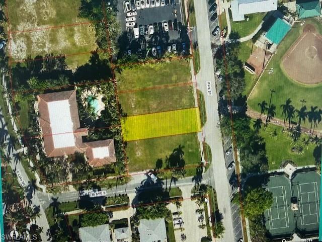 Welcome to your future dream home site. Ideally located less than a one block walk from the fabulous 5th Ave South with its abundance of world class shopping, dining and entertainment. If the beach is your thing this lot is located a short 6 block walk or bike ride away. Enjoy the beautiful view of Cambier Park with access to tennis and so much more. The adjacent lot to the south is also available at $3.8 Mil. if your goal is to build that grand estate home. Take advantage of this ideal location to carve out your little slice paradise now!