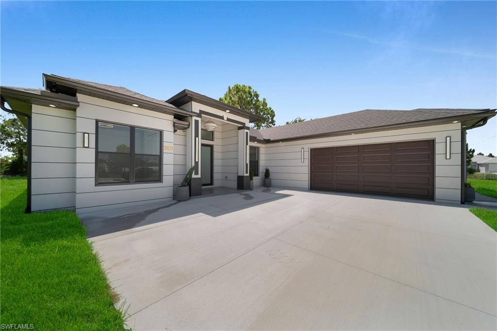 BRAND-NEW CONSTRUCTION • IMPACT WINDOWS & DOORS*** Beautiful 4 bed / 3 bath home with 2,950 total sq ft (1,860 under A/C) and a layout that just feels right. High ceilings, porcelain tile throughout, and a bright open living space from the moment you walk in.** Built on an oversized lot, offering more space and privacy than a typical homesite.The outdoor living area is summer kitchen ready, featuring a pre-installed BBQ exhaust hood plus electrical outlets already in place.** Primary suite feels like a spa, plus a second master suite perfect for guests or extended family. 8-ft sliders open to an extended lanai. Includes impact windows & doors, epoxy garage , paver driveway, .** Easy to show. Bring your offer — let’s make a deal happen.