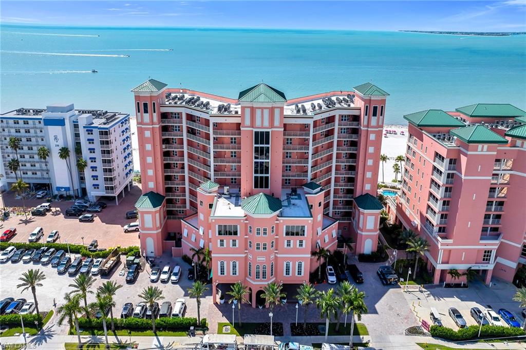 Enjoy sweeping Gulf views and effortless beachfront living from this beautifully updated one-bedroom, one-bath residence in the renowned Pink Shell Resort on the north end of Fort Myers Beach. Positioned in the desirable White Sand Villas and conveniently on the main floor, this spacious condominium offers a thoughtfully designed floor plan. The living area and bedroom open directly to a private screened balcony overlooking the Gulf and the island’s famous white sand shoreline. From sunrise coffee to spectacular evening sunsets, the serene coastal backdrop creates an unforgettable setting. Recently updated in 2025, the stylish interior blends comfort and functionality with a full kitchen, inviting living and dining areas, and the convenience of in-residence laundry. Expansive glass doors fill the home with natural light while framing the panoramic beach and water views. The open layout allows for seamless indoor-outdoor living, and the bedroom’s direct balcony access provides a peaceful retreat where the sound of the waves becomes part of everyday life. Ownership in this exceptional resort offers the rare combination of personal enjoyment and professionally managed income potential. Owners may enjoy up to 28 days of personal use each year, including 14 days during peak season and 14 days in the off-season, while the on-site management team handles reservations, operations and guest services throughout the remainder of the year, providing convenient monthly income and carefree ownership. Owners also enjoy access to the resort’s amenities year-round. The Pink Shell Resort is one of the island’s premier waterfront destinations, offering an impressive array of amenities including multiple resort-style pools, a full-service marina, fishing pier, watersports, a state-of-the-art fitness center, a luxury spa, and an active schedule of family and children’s programs. Guests and owners enjoy several on-site dining options, including beachfront restaurants and lively poolside tiki bar, along with concierge services, a business center, ice cream shop, beach bar and boutique shopping. Ideally on the quieter north end of the island, this exceptional property is just moments from the vibrant energy, placing you within easy distance of the island’s dining, entertainment and waterfront activities. Offering breathtaking Gulf views, resort-style amenities and built-in rental management, this beautifully updated beachfront residence presents an outstanding opportunity to own a carefree coastal retreat and income-producing investment in one of Southwest Florida’s sought-after beach destinations.