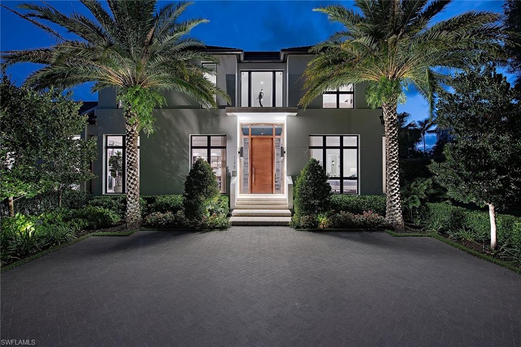 Like new, coastal contemporary home in sought-after Coquina Sands. Discover luxurious living at this one-of-a-kind residence complete with a home automation system, four-car garage, resort-style pool/spa and outdoor fireplace! Each of the bedrooms have their own en-suite bathrooms, and the master retreat features a contemporary walk-in shower with multiple shower heads, free-standing soaking tub and dual sinks. Modern design and décor can be found throughout the home, showcasing floor-to-ceiling windows, pocketing sliders, 2nd-floor wet bar and a true chef’s kitchen with top-of-the-line appliances. Entertaining is a breeze with expansive outdoor living which encompasses a full kitchen with a gas grill, bar seating, dining area, and living area with an outdoor fireplace. Residence was designed by Falconer Jones and Jeffrey Fisher Homes and built by BBA. Home is conveniently located one block to the beach, just a short distance from 3rd Street South, and minutes from 5th Avenue South’s fine dining and world-class shopping.