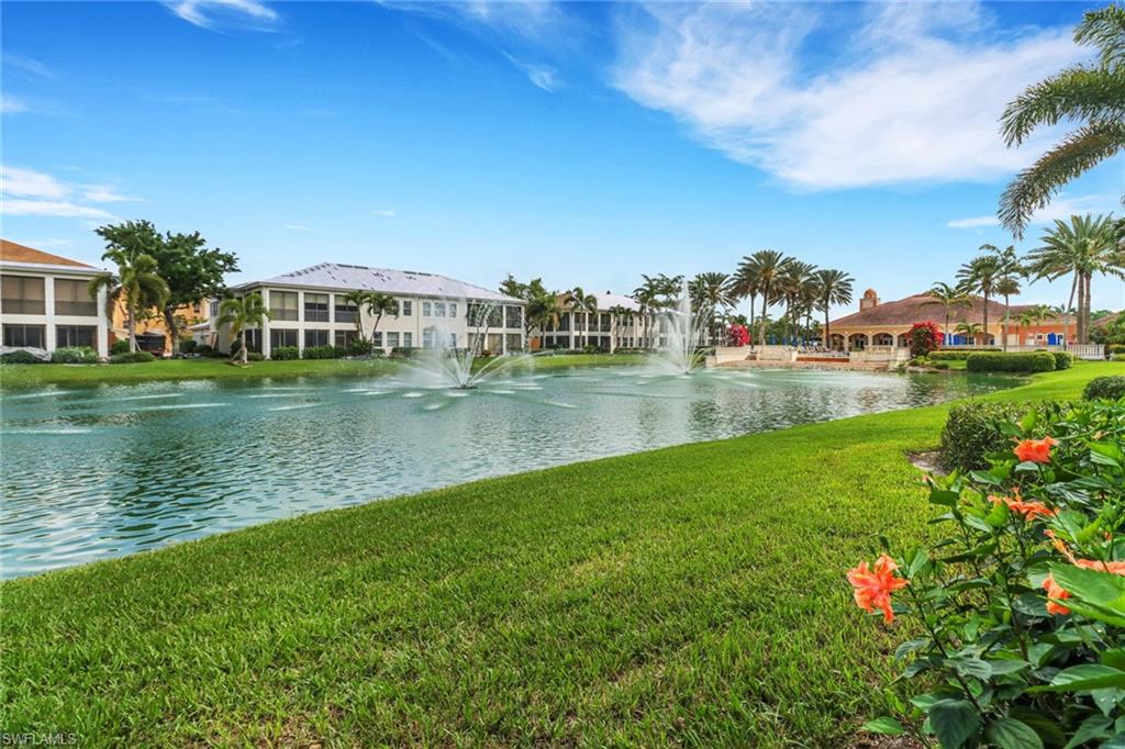 SPECTACULAR VIEW of lake, clubhouse and 6 fountains!  TURNKEY FURNISHED and well appointed with neutral colors, this immaculate 2,845 square-foot condo boasts three oversized bedrooms~all with en suite baths and large walk in closets. The primary bedroom offers his/her walk-in closets, double sinks in the bathroom with soaking tub separate from the shower and a large linen closet for extra storage.  The cozy den invites you to relax and get comfortable with a good book or watch your favorite TV show.  If you choose to do so, the den may also be used as a formal dining area.  The spacious kitchen has a large pantry and plenty of cabinets which makes storage easy. Along with the kitchen area, the breakfast nook is open to the living area~ this allows for easy entertaining or just relaxing with guests.  Push back the 2 large corner sliders to join indoor with outdoor living. The wrap around lanai boasts an impressive view of the lake, six fountains, and the infinity pool.  When you're away the entire lanai can be closed down using the electric rolldown shutters.  This condo shows pride of ownership and is in move-in condition.  Avellino Isles is a very private neighborhood located behind the Vineyards guard gate as well as its own grand entry gate. It is beautifully landscaped and offers a world class clubhouse with a fitness center, library and card room. The grand room at the clubhouse overlooks the infinity pool, spa and a beautiful grilling area for you to enjoy a cookout by the pool!!  All buildings are in the process of brand new roofs and are being painted with an updated color scheme!!