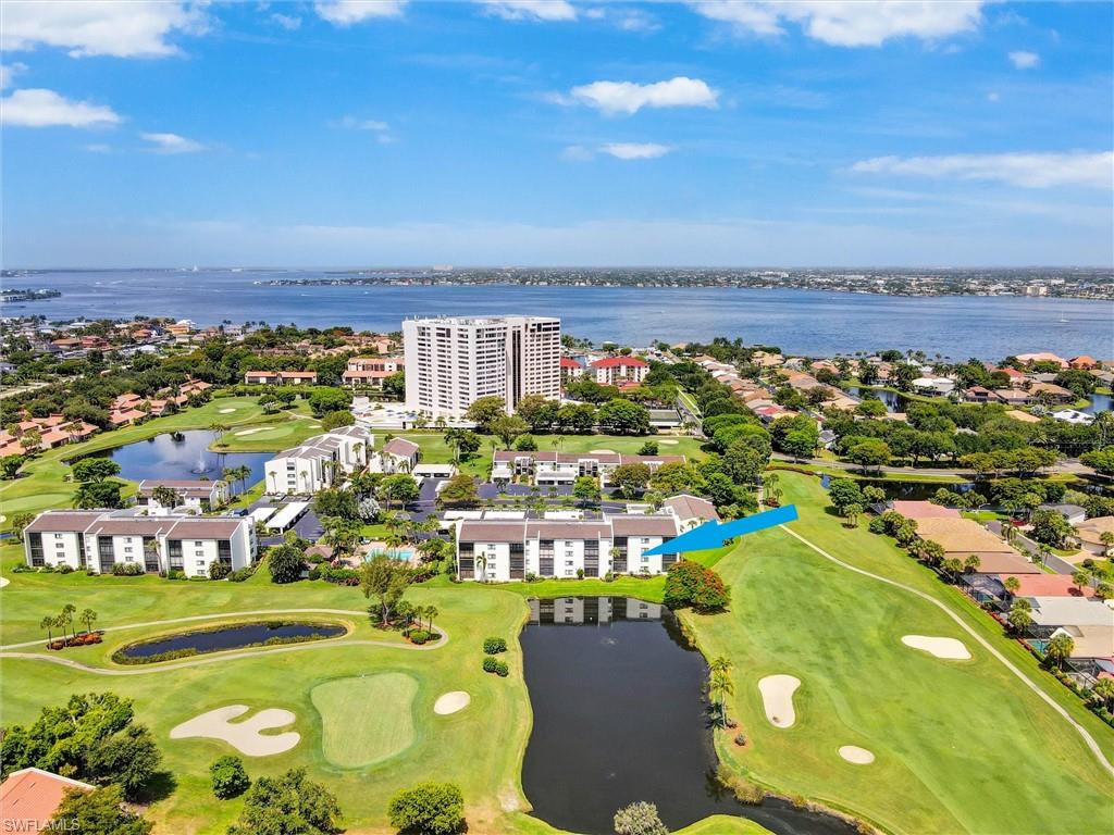 Delight in the fantastic lake and golf views all day in this beautifully updated 2-bedroom second floor unit in centrally located and highly desirable Trawler Village. Featuring large format tile throughout, upscale lighting and window treatments, granite counters, updated baths and contemporary furnishings, you’ll only need to bring your clothes and toys. This immaculately kept condo is being offered turnkey.  Make it your escape to paradise and/or take advantage of its excellent rental history.
The Landings Yacht Golf & Tennis Club is a prestigious 250-acre riverfront community offering resort-style living in a lush, beautifully maintained setting. With intimate village neighborhoods, scenic views, and a secure, maintenance-free environment, it provides an inviting blend of comfort, convenience, and natural beauty.
Ownership includes bundled club membership, giving residents access to golf, tennis, pickleball, bocce, fitness, walking and biking paths, fishing, dining, and a vibrant social calendar. The Helm Club, private marina, and waterfront Wheelhouse Grille create a lifestyle centered on recreation, connection, and easy access to the Caloosahatchee River, Intracoastal Waterway, and Gulf.  Come see why this is southwest Florida's best kept secret!