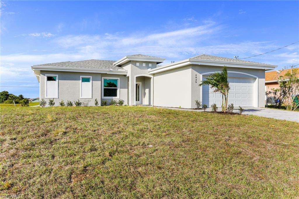 DON'T WAIT **Complete by End Of May 2021** Prime Location!! Welcome to NW of Cape Coral, one of the fastest growing areas in the beautiful city of Cape Coral !! This wonderful modern open floor plan concept, 8 foot tall doors, 10 foot Tray Ceilings  brand new Single Family Home (Rincon Model); features nearly  1,700 Sq. Ft of living space, 3  bedroom plus den,  2 Full  new bathrooms with Quartz, 2 car garage . Freshly painted inside and out, epoxy in garage, pavers in driveway, new kitchen with soft-close cabinets, Quartz counter tops, new stainless steel appliances, new doors, new based boards,  new  AC system, new light fixtures, new plumbing, new smoke detectors,new water heater, new well equipment. Home is equipped with Taex built-in pest control system, irrigation system,  hurricane impact doors and windows, laundry room,  Spacious master bedroom, new master bath, double-sink, 1 huge walk-in closet, new plank tile throughout the home. The location is close to many of Cape Coral top schools, closer to US 41, North Fort Myers, hospitals,  shopping, dining, entertainment & just 25 mins to SW Florida International Airport. NO HOA Fees. This home will not last.