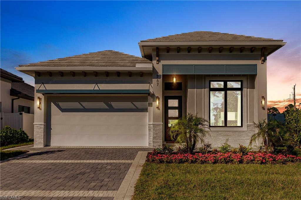 If you're looking for an opportunity to own a professionally decorated, TURNKEY FURNISHED, 4 BD. 3 BA. better than new home for full-time residency, seasonal, annual, or vacation rental, (financials attached) west of 41, no HOA fees and blocks to the Gulf of Mexico then your search has ended. Listen to just some of the amenities and upgrades this home has and see why we think this is arguably the best deal in all of Naples Park. Stone pavered driveway. HURRICANE WINDOWS AND SLIDERS THROUGHOUT! 14ft. ceilings. White ash porcelain plank style flooring throughout so no carpets to continually clean or replace. Gorgeous open concept gourmet kitchen with island breakfast bar, quartz waterfall counter tops, white shaker soft close cabinets and drawers, Walker-Zanger tile backsplash, and Kitchen-Aid Stainless Steel Appliances. Formal dining area. Sizeable family room with faux fireplace, shiplap ceilings and serving bar with wine fridge, perfect for relaxing or entertaining. Spacious Master bedroom with beamed ceilings and sliders leading to the lanai. Stunning Master bathroom with stepdown walk-in shower with Pietra Rustico Carrera rectified porcelain tile up the walls to the ceiling, free-standing soaking tub, dual vanities with quartz tops, private water closet and a huge walk-in built out closet. 2 car garage with plenty of storage space and epoxy floors. Large utility room with lots of storage space, folding table, utility sink and quartz tops. Solid core doors throughout. Now step outside to the lanai featuring plenty of covered space with shiplap ceilings, Atlantic Coquina Shell stone pavers, gorgeous pool and spa with sun shelf and rainbow waterline tile. Outdoor Bull Brand built-in kitchen package and level 5 exotic Colonial Grey-Cream granite tops. Electric screen enclosure. Large entertaining/sitting area with fireplace. No need to wait for new construction and all the hassles that entails when a home like this comes along that was built in 2023. It doesn't get much better than this! And the list goes on and on. See if you can find a home with these amenities and upgrades, in this condition, in this location, for this price then come and see what a real deal looks like in Naples Florida. Welcome Home.