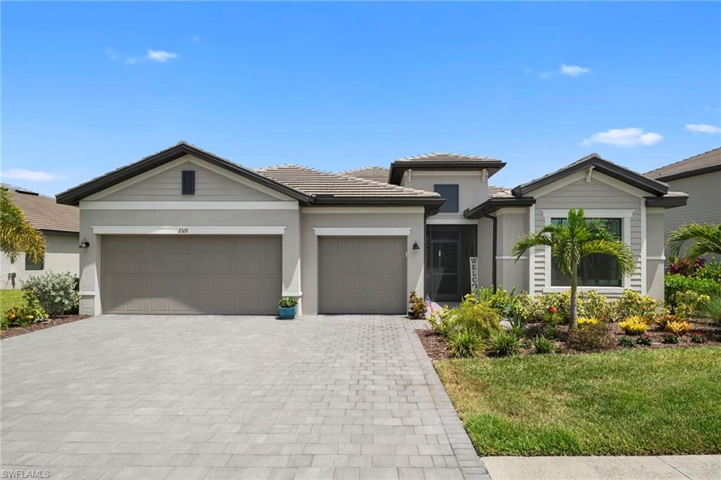 Rarely does a property of this caliber, featuring a premium waterfront location, become available in the highly sought-after community of Timber Creek. This highly desirable Summerville II floor plan features 3 bedrooms plus a den, 3 bathrooms, and a spacious 3-car garage. Positioned on a premium waterfront lot, the property features a private custom pool with an oversized lanai paired with a serene, wide-water south eastern view—offering the absolute ideal setup for Southwest Florida outdoor living.

Inside, the home is defined by an airy, open-concept layout and soaring 9-foot ceilings that maximize natural light. The spacious great room is anchored by a sophisticated, custom-built media wall unit. High-end functional upgrades are present throughout the home, including premium upgraded appliances, custom cabinetry organization drawers in the kitchen, and fully customized built-in closet systems in the bedrooms.

Beyond the private pool oasis, residents of Timber Creek enjoy access to five-star, resort-style amenities. The expansive clubhouse campus includes a full-service on-site restaurant, a massive resort pool, a state-of-the-art fitness center, and championship-grade tennis and pickleball courts. Providing a rare combination of custom interior upgrades and premium water views, this property stands out significantly from standard builds in the community. Schedule your private tour today.