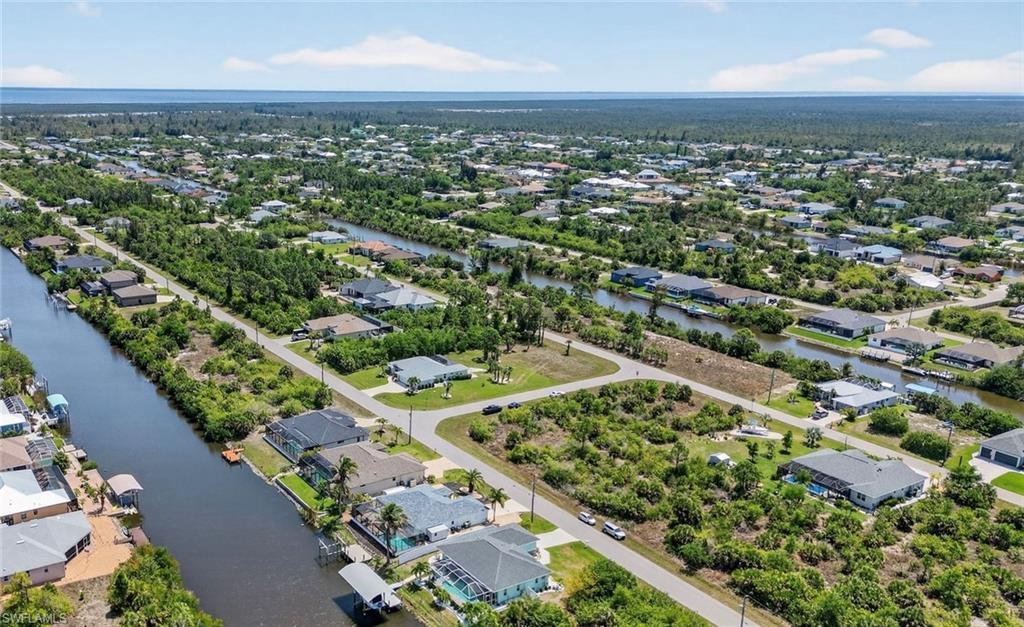 Imagine building the home you've always dreamed of—designed entirely around your lifestyle, your vision, and your family's needs. This oversized corner homesite offers the perfect canvas to create a one-of-a-kind retreat in the peaceful and highly desirable South Gulf Cove community. Enjoy the convenience of CITY WATER available at the property, making it an exceptional location to bring your plans to life. Just minutes from Englewood's pristine beaches, sparkling Gulf waters, and stunning coastal sunsets, you'll experience the very best of Florida living.     
                                    
Whether you're looking for a full-time residence or a seasonal escape, South Gulf Cove offers a vibrant lifestyle with year-round community activities, parks, nearby boat ramp, and endless opportunities for outdoor recreation. Don't miss your chance to secure this exceptional homesite and begin your next chapter in beautiful South Gulf Cove—where your dream home and Florida lifestyle await.