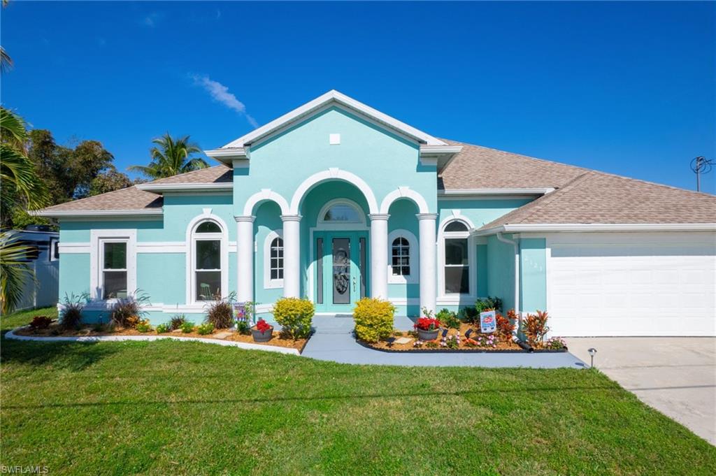 Enjoy the breathtaking view of the freshwater intersecting canals with Seminole Lake right in your backyard, wake up every morning listening to the tranquil sound of water from the pool waterfall, and gaze at the beautiful and expansive water view! Stunning 3 Bedroom 2 and a half bathroom pool home with lots of updated touches Kitchen with modern appliances(2021) the crystal blue pool allows for fun and relaxation for all to enjoy. The home's exterior was freshly painted in 2023. The oversized Lanai is great for entertaining and sharing lasting memories with friends and family,  stand-alone jacuzzi(2019) provides great massage to complete relaxation.  The master bathroom features a separate oversized soaking tub, a walk in shower, and dual vanities.  New landscaping in 2023 The freshwater intersecting canals provide access to lakes allowing activities such as fishing and kayaking to add more fun. Centrally located with easy access to Ft. Myers, North Fort Myers, and all of Cape Coral. All assessments are in and paid in full. AC installed 2019 . Come take a look, you will fall in Love.