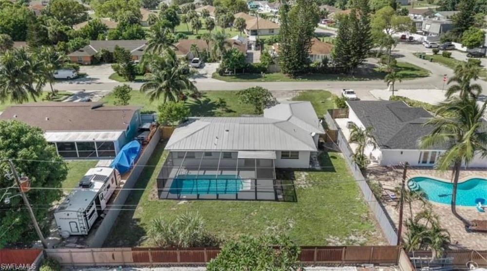 Discover this beautifully updated 4-bedroom, 2-bath pool home perfectly situated in the heart of Naples, offering the ideal combination of comfort, style, and convenience. The spacious open-concept floor plan is filled with natural light and features elegant ceramic tile flooring throughout, creating a seamless and modern living space.
The gourmet kitchen is designed to impress with sleek quartz countertops, a charming farmhouse sink, ample cabinetry, and generous prep space—perfect for both everyday living and entertaining. Fresh interior paint enhances the home's bright, clean, and move-in-ready appeal.
Step outside to your own private backyard oasis, where the sparkling pool provides the perfect setting to relax, entertain family and friends, or enjoy the Florida sunshine year-round. The fully fenced yard provides added privacy, security, and plenty of space for children, pets, and outdoor activities.
With no HOA fees and no rental restrictions, this property offers exceptional flexibility for homeowners, seasonal residents, or investors. There's also plenty of room to park your RV, boat, or additional vehicles, making it ideal for those who enjoy an active outdoor lifestyle.
Conveniently located just minutes from Naples' world-famous beaches, shopping, dining, golf courses, parks, and top-rated schools, this exceptional home truly offers the best of Southwest Florida living. Don't miss this incredible opportunity to own a piece of paradise!