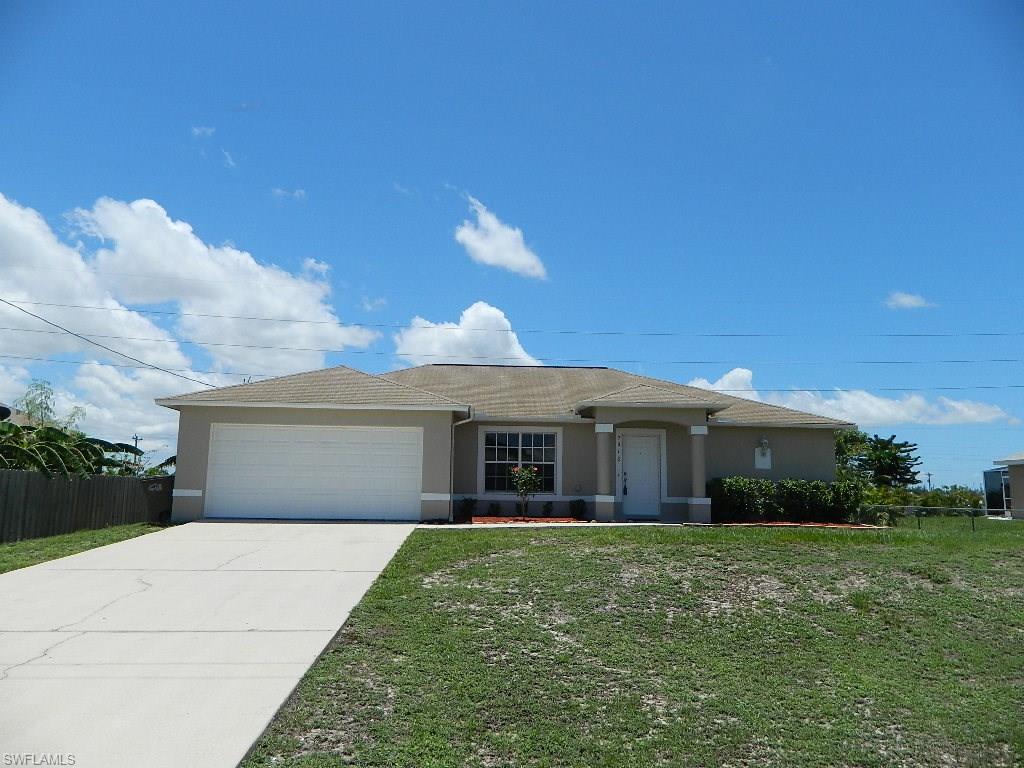 Move-in condition.  Freshly painted inside and out. New carpet.  Newer range and dishwasher.  Great room floor plan with high ceiling.  Screened lanai.