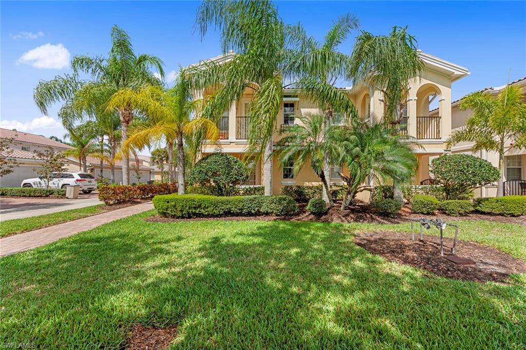 Rarely available “built solid” Caymen model 3 bed 3 bath 2 car garage End-unit townhome with private pool, located in the popular gated community of Village Walk of Bonita Springs! Each spacious bedroom features a walk-in closet with California style closet inserts, and attached full bath- plenty of privacy, perfect for guests!  First floor guest bedroom has separate entrance leading to porch out front. Kitchen is open to living area which leads to the courtyard and private HEATED pool to enjoy year round! Remote-controlled awning allows for plenty of shade to dine pool side. Second floor laundry room has laundry sink, cabinets for additional storage. Two master suites on second floor, one with private balcony! Second master features additional sitting area or space for desk! At the community Town Center, you will find plenty of amenities for all- resort and lap pools, tennis, fitness center, bocce, pickleball, bagel shop, bar&grill, basketball, spa, hair salon, tot-lot, even a gas station and car wash! 22 miles of scenic trails for walking/riding.  Pet and golf cart friendly, low HOA fees, close to beaches, shopping, dining, entertainment, RSW airport! Hurry this one won't last!