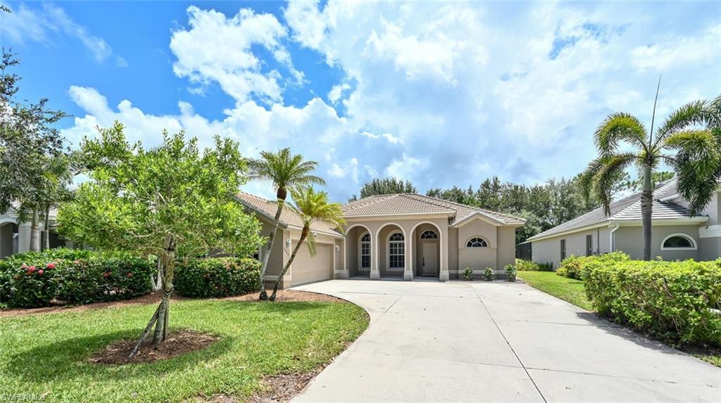 Welcome to prestigious, sought after Autumn Woods! Nestled on an expansive ¼ acre lot, the Areca model beckons with its 4 bedrooms, 3 baths & 2-car garage. Prepare to be charmed by the split bedroom layout, the spacious & airy open floor plan, and the grandeur of vaulted ceilings. This home has a newer roof done in 2019, repainted the interior, new vinyl flooring and new stainless steel appliances.  Autumn Woods is more than a neighborhood; it’s a lifestyle with swaying palm trees & towering pines, surrounded by serene lakes that reflect the tranquility of this community. As a resident, you'll relish in the abundant shared amenities, from the inviting heated pool & spa to the fitness facility, the playground & basketball & tennis courts. It's not just about the home; it's about the location. The Oak Hollow Mahogany Run section places you within arm's reach of top-rated Collier County schools, places of worship, the sun-soaked beaches of Naples, and upscale shopping that will satisfy even the most discerning tastes.