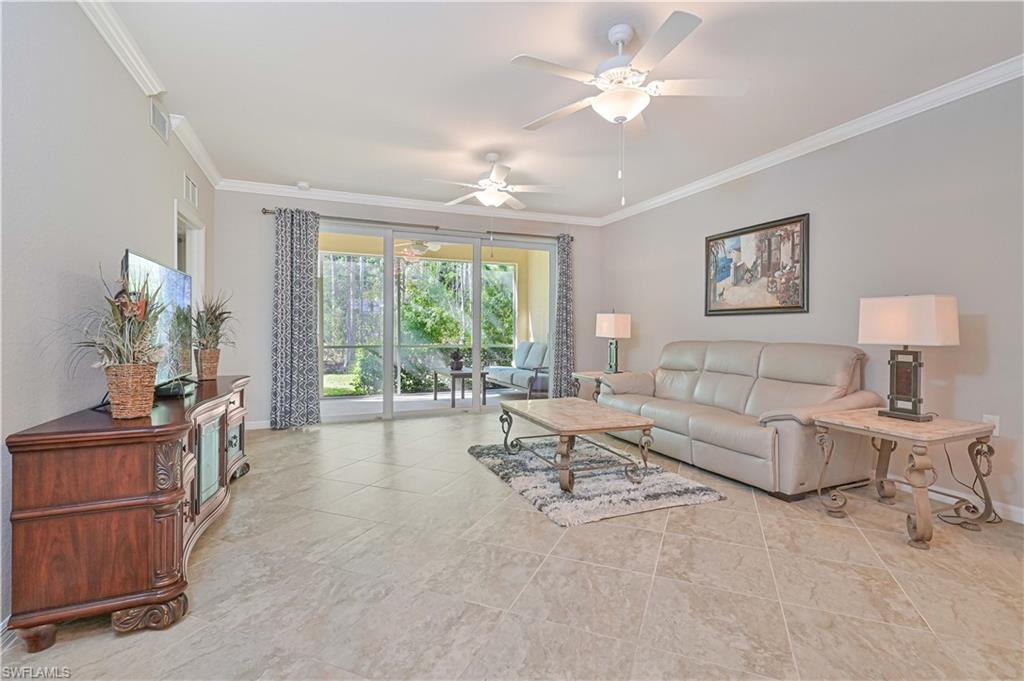 FURNISHED | GROUND-FLOOR CONDO WITH PRESERVE VIEWS IN PELICAN PRESERVE l FORT MYERS, FL - Experience effortless Florida living in this beautifully appointed ground-floor condominium located in the highly desirable Palazzo neighborhood of Pelican Preserve, Southwest Florida's premier 55+ active adult community. Built in 2019, this modern residence combines contemporary design, energy efficiency, and low-maintenance living with all the benefits of newer construction.

The thoughtfully designed open-concept floor plan features split bedrooms for maximum privacy, volume ceilings, abundant natural light, and a spacious great room ideal for entertaining family and friends. The chef-inspired kitchen serves as the heart of the home, showcasing a large quartz center island, ample cabinetry, and seamless flow into the living and dining areas.

Step outside to your private 16' x 9' screened lanai and enjoy tranquil views of a 31-acre nature preserve and expansive green space, creating a peaceful backdrop rarely found in condominium living. The generous lawn area is ideal for pet owners and nature lovers alike.

Just steps from your front door, Palazzo residents enjoy exclusive neighborhood amenities including a resort-style pool, spa, outdoor grilling area, and private gathering spaces. Beyond the neighborhood, Pelican Preserve offers an unparalleled lifestyle with a recently expanded Town Center featuring fitness facilities, indoor and outdoor pools, tennis, pickleball, dining venues, entertainment, clubs, classes, and countless social activities. Residents can conveniently access these amenities by bicycle, golf cart, or a short drive.

Optional golf memberships are available, making this home the perfect choice for those seeking an active, social, and resort-inspired lifestyle in one of Fort Myers' most sought-after communities.