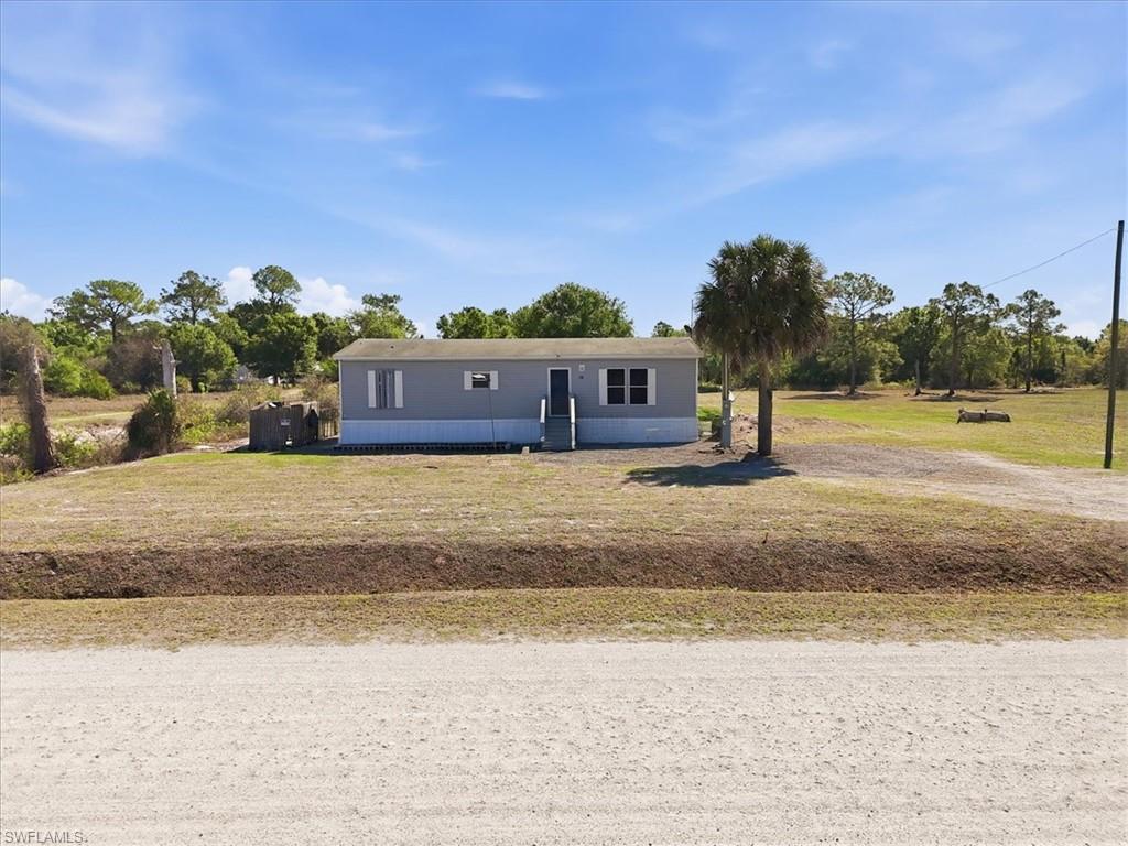 1.25 Acres of Freedom,  Land, Privacy & Possibilities— No HOA, Bring Your Toys, — Now Offered at $270,000. Discover the freedom of country-style living in Montura Ranch Estates with this 3-bedroom, 2-bath home situated on a spacious 1.25-acre lot. Built in 2016 and offering 1,344 square feet of living space, this property combines comfort, privacy, and flexibility at an affordable price point. Inside, you'll find tile and laminate flooring throughout, stainless steel appliances, and a functional layout designed for everyday living. Outside is where the opportunity truly expands—bring your RV, boat, trailer, work vehicles, or create your dream outdoor setup with room for a pool, workshop, garden, or additional storage. With no HOA, you have the freedom to use your property your way. Located within reach of Lake Okeechobee, enjoy nearby fishing, boating, and outdoor recreation while still having access to Clewiston, LaBelle, and surrounding areas. 
If you’ve been looking for land, privacy, and value in Southwest Florida, this is your opportunity.
Schedule your private showing today and experience the space, privacy, and possibilities this property has to offer.