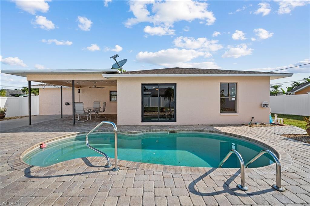 Price Improvement - Don't miss your chance to own this extraordinary pool home featuring 3 bedrooms plus a den/flex room, 2 bathrooms and an open floor plan that connects the living, dining, and kitchen areas. Brand new electrical panel (2023) Roof and plumbing (2018), interior and exterior paint (2022), pool pump (2021), all provide worry-free living and minimizing any potential maintenance concerns. Other updates include LED lighting, ceiling fans, bathroom (marble floor) and plantation shutters.
New impact, pocketing slider to pool, open to a backyard oasis with resurfaced (2020), in-ground pool, re-sealed pavers and new privacy fence. Garnish your poolside beverage with a fresh picked lemon from your own fruit tree.  A southern rear exposure provides full sunshine on your pool and natural light for your home. 
Nestled in desirable SE Cape Coral, you can explore nearby beaches, indulge in waterfront dining, or simply embrace the laid-back Florida lifestyle. 
Your dream home awaits!