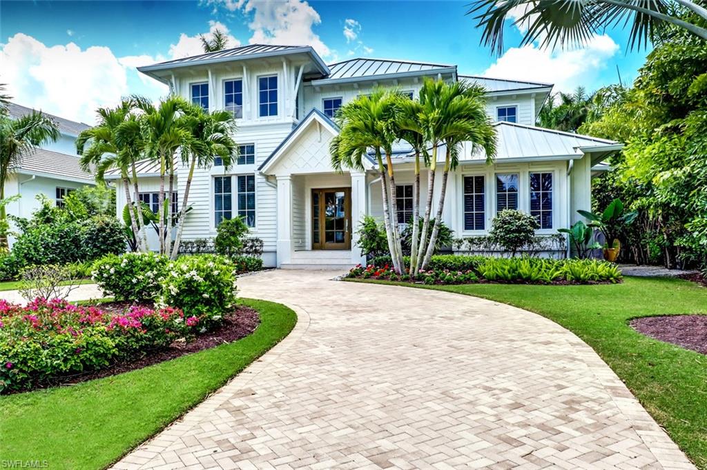 Seldom does an executive home opportunity like this become available in any market, and in Naples, Florida - this is a dream property. Moreover, this incredible residence was the winner of Home & Design Magazine’s 2016 Signature Home of the Year! It is a 5 bedroom, 6 ½ bath jewel that comes with all the accoutrements that you would expect in a home of this caliber. The southern exposure compliments the indoor/outdoor flow of this home. The first level master suite is positioned perfectly to provide you with ample space and privacy from the 3 upstairs en-suite bedrooms for family and guests to enjoy. What’s more is there is an additional 5th bedroom which is set up as a cabana with its own private entry! The covered outdoor cooking center perfectly matches the needs of an active family, while the chef inspired main kitchen provides all the space, amenities and equipment that you will need for guest entertaining. With its proximity to local beaches and the bustling 5th avenue shops and restaurants, you can enjoy a long day of exploring the charms of Southwest Florida.