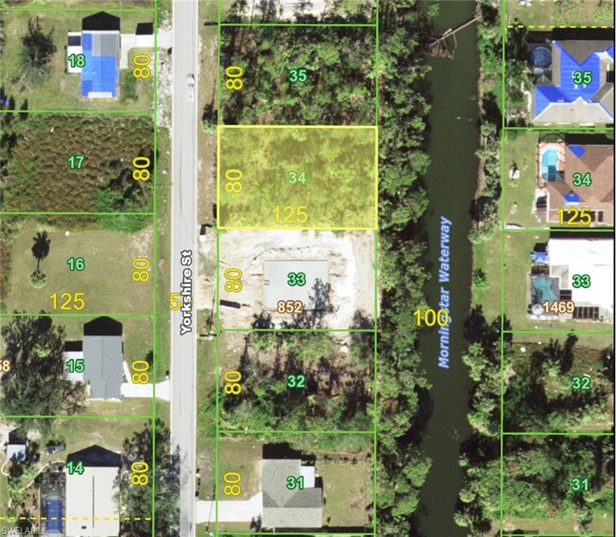Waterfront Lot!! Very nice Freshwater canal lot on the Morningstar Waterway. Suitable for single family home or duplex. 100% UPLAND, DEP Report available for serious buyers.