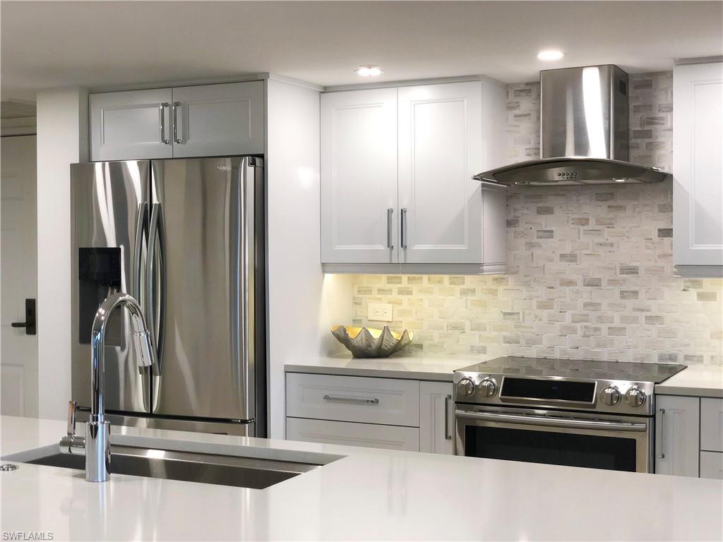 'WOW' OWNERS SAY SELL, THEY FOUND ANOTHER HOME! BEST DEAL BY FAR!
This completely remodeled and designer furnished spacious 3 BR unit in St. Marissa at Pelican Bay is waiting for you. Nestled amongst the palm tree tops, Unit 205 offers privacy yet easy access in and out of the building. It is an outdoor lover’s dream. Swim laps in the elegant and well-maintained pool or stroll over and take the tram to the beach through the most exquisite nature trails. All that’s missing is you.

• 3 BR 2 Bath spacious 1,643sf under air
• Easy access 2nd floor location (elevator or stairs)
• All LED lighting
• Toe kick, breakfast bar, and under cabinet LED lights  
• Kohler and Moen plumbing fixtures
• 3M solar reflective film on all exterior glass
• Sonos sound system
• Smart thermostat with wifi control
• Hi efficiency on demand hot water heater
• Full size stacked laundry set
• Soft close doors and dovetailed drawers in kitchen and baths
• Quartz counter tops throughout
• Remote controlled fans in living area and bedrooms
• Bosch ultra-quiet SS 3 rack dishwasher
• Sharp SS drawer style microwave
• Samsung SS slide-in range
• Samsung SS French door fridge with dual ice makers
