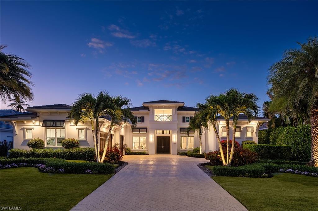 This luxury home built in 2019 is in the beautiful tree-lined neighborhood of the Moorings, one of Naples exceptional coastal communities. Upon entering the front doors, you are welcomed with wonderful views of the 18th tee on the private Moorings Country Club. The single-level, open floor plan has been artfully designed with a neutral palette, creating a lovely and relaxing ambiance. The four en-suite bedrooms, four- and one-half baths, large office and expansive custom kitchen easily open up to the comfortable outdoor living area for year-round entertaining with family and friends. The quality and high- end features include Sub-Zero/Wolf and Bosch appliances, wide plank wood flooring, Sonos sound, retractable screens and shutters, Anderson windows, 38-kilowatt generator and a large three-car garage. The property is in an X Flood zone as well. Minutes from the Moorings private beach, the fine dining of delightful Old Naples, and fabulous shopping in Waterside Shoppes and Venetian Village.