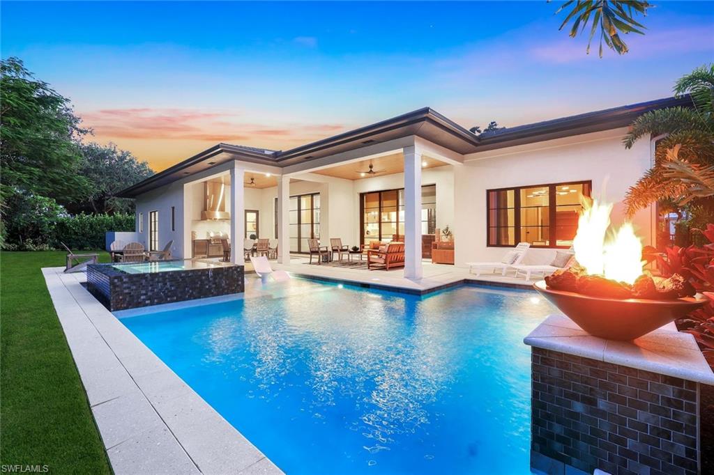 Outstanding home completed in September of 2023. Located in an X flood zone, this home is being offered move-in ready, fully furnished. Four bedrooms with en-suites that include completed California Closets. Many upgrades from light fixtures to the top of the line kitchen which includes an Electrolux/Sub-Zero/Wolf appliance package. The backyard is a tropical oasis with a one of a kind pool/spa that features water fountains with fire bowls. Eat outside in the outdoor kitchen or relax by the fire pit while enjoying all this beautiful, coastal home has to offer.