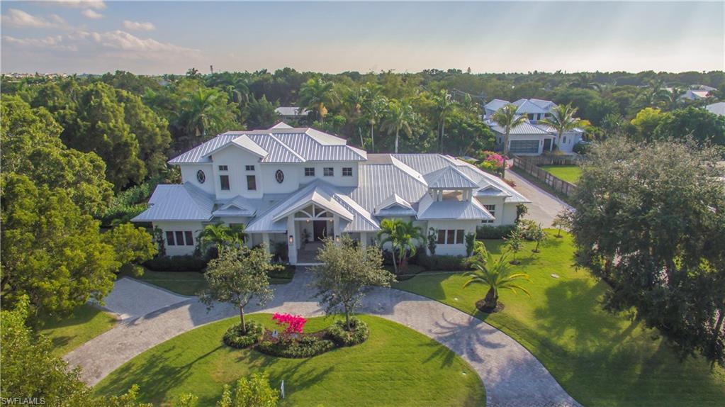 Situated in the heart of Olde Naples, just 4 & 1/2 Blocks to the Beach, this sprawling NEW southern exposure single family home offers five bedroom, Study, Fitness Room,  six full and one half baths, is sure to impress with approximately 4,395  sq. ft. under air and a beautifully serene outdoor area including an outdoor kitchen, a gorgeous pool and spa with serene water features. This expansive plan affords plentiful areas to entertain with 3,575 sq.ft. on the first floor including a private master suite, study, oversized great room, Butler’s pantry, formal dining room, and one bedroom guest quarters with separate private access.The second floor includes 3 bedrooms with ensuite bathrooms a flexible loft space and balcony overlooking the pool. A four-car garage, gourmet kitchen and designer finishes throughout the property are among the many upgrades. House features:solid built concrete block throughout;Wolf and Sub Zero Appliances;hardwood oak floors;Carrera marble bathrooms and countertops;custom built cabinets;High impact windows;Sonos surround sound;Lutron lighting system;3 laundry room;ample storage.