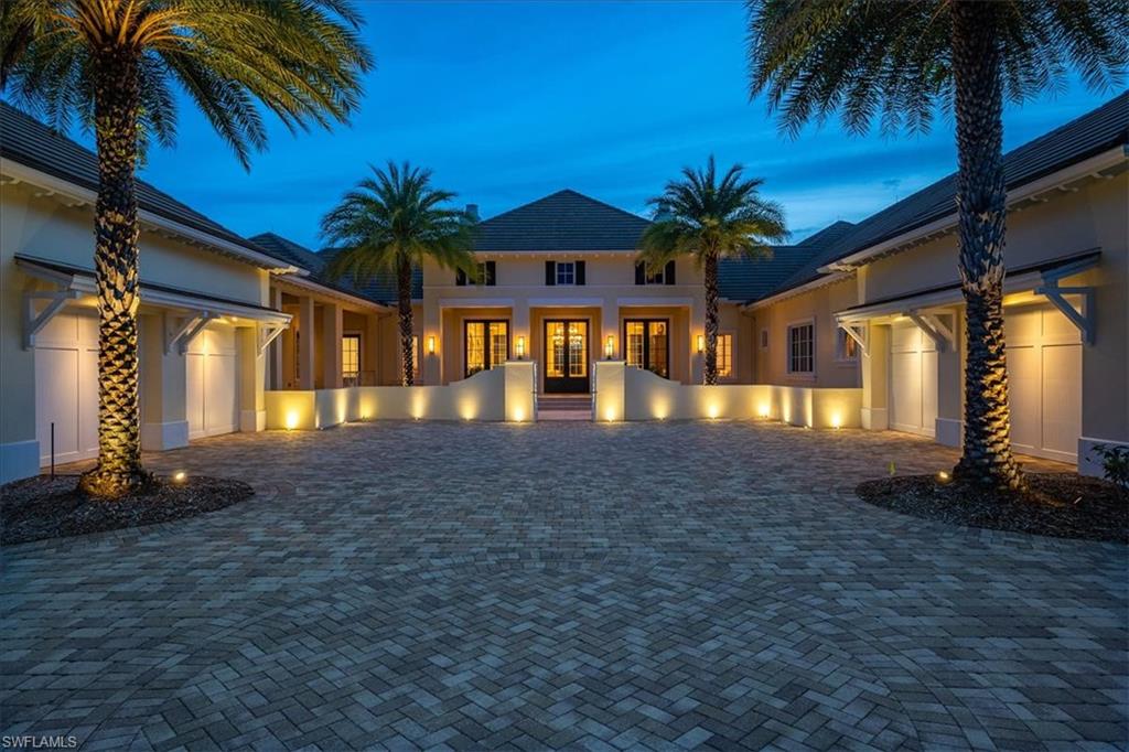 H3141 - This furnished custom estate features a tailored RL style white-on-white design coupled with rich wood tones and offers generous views of the Lakes 7th fairway. The expansive lanai highlights a sparkling custom saltwater pool with integrated spa and sundeck, fire bowls. and extensive outdoor covered spaces with retractable screen system, outdoor kitchen, fire pit areas and multiple high-end TV’s. Quality features abound including tumbled tile flooring in main living areas, bamboo and wood flooring in bedrooms and study plus pebble-stone flooring in the pool/powder bath. Custom cabinet built-ins and elegant light fixtures are highlighted throughout. The gourmet kitchen opening to the spacious FR is a cook’s dream and offers a generous island, 6 burner gas range w warming drawer, wall ovens, 2 dishwashers and butler’s pantry w wine fridge. A split floor plan offers all en-suite guest rooms in private wings. Both garages are AC’d, add’l features inc. 3 newer HVAC zoned units, AV Towers, whole house generator, 2 propane tanks and lightning protection system. Private courtyard w fire pits just off the custom home office and the turf grass side yard completes your wish list.