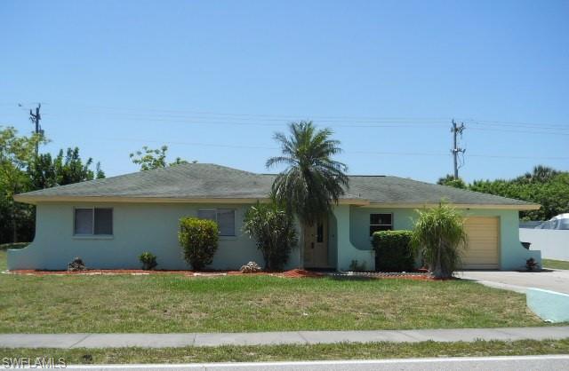 Great home for those just starting out or those looking to downsize. This house has 3 bedrooms, 2 baths and tons of living area. Nice back screened lanai with roof, new paint inside and out, new range, new flooring in bedrooms. Master bedroom has a large walk-in closet with built in shelving and the other closets have built ins as well. The roof is 8 years old so plenty of life there and the house itself is solid as a rock. Stop by to see it today.