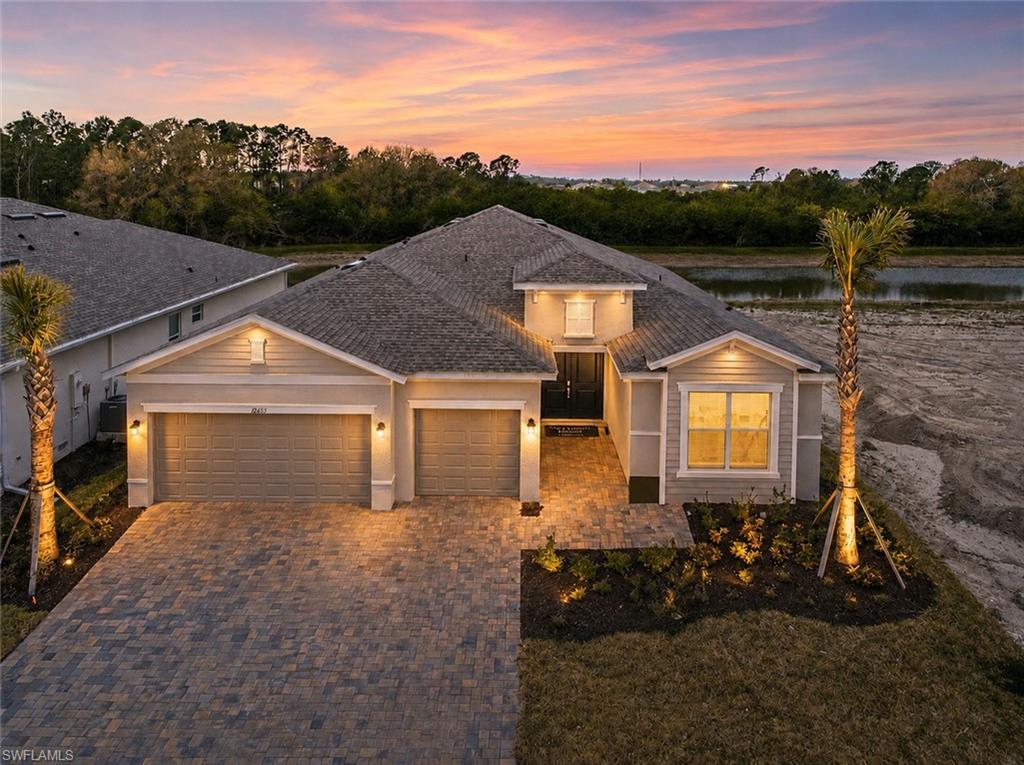 Welcome to this exceptional former fully furnished model home that has never been lived in, featuring the highly sought-after Summerville floor plan in the resort-style community of Brightwater. Offering 3 bedrooms, a den, 3 full bathrooms, and a spacious 3-car garage, this beautifully upgraded residence showcases designer finishes and custom details throughout.

Perfectly positioned to capture tranquil water and preserve views, this home offers both privacy and picturesque scenery. The open-concept great room is highlighted by custom beam work in the tray ceilings, designer lighting, and extensive millwork that adds elegance and character to the living room, dining area, and owner's suite. Impact-resistant windows provide peace of mind, energy efficiency, and abundant natural light throughout the home.

The thoughtfully designed single-story layout provides both comfort and functionality, featuring a spacious den off the foyer, an expansive main living area, and seamless access to the covered lanai for indoor-outdoor living and entertaining while enjoying the serene water and preserve backdrop.

The luxurious owner's suite offers a private retreat, while a secondary suite and additional guest bedroom provide ample space for family and visitors. Offered fully furnished and never occupied, this home is truly move-in ready—simply bring your suitcase and begin enjoying the Southwest Florida lifestyle.

Residents of Brightwater enjoy access to incredible community amenities, including the renowned Brightwater Lagoon—a six-acre crystal-clear lagoon surrounded by sandy beach areas, resort-style features, swim-up bars, and entertainment spaces designed for recreation and relaxation. Additional amenities include a clubhouse, cabana, community pool, and community gathering spaces.

Conveniently located just off I-75 and Bayshore Road, this prime location offers easy access to Fort Myers, Estero, Bonita Springs, Naples, Punta Gorda, and Port Charlotte. Enjoy nearby shopping, dining, entertainment, and everyday conveniences while living in one of Southwest Florida's most exciting master-planned communities.

This rare opportunity combines the benefits of a professionally designed former model home, never-lived-in condition, premium upgrades, impact-resistant windows, full furnishings, beautiful water and preserve views, and resort-style amenities—all in one exceptional property.