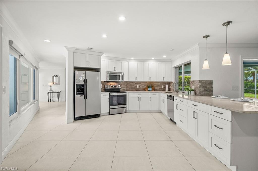 Prime Naples Location west of 75.  Welcome to this beautifully maintained 3-bedroom, 2-bathroom pool home backing directly to La Playa Golf Course, offering serene views and an unbeatable location just minutes from Mercato, Vanderbilt Beach, and Wiggins Pass.
Step inside to find large tile flooring throughout the main living areas and an updated kitchen ready for everyday living and entertaining. A sizeable laundry room adds everyday convenience, while central vacuum makes upkeep effortless.
Outside, your private pool and spacious yard create the perfect backdrop for relaxing or entertaining against the golf course backdrop. The pool is solar-heated (system replaced in 2017) with a newer pool pump, and a private well with a newly replaced irrigation pump keeps your landscaping lush without the added cost to your water bill.
This home has been thoughtfully cared for with updates including a whole-house repipe, a newer impact-rated garage door, a mix of impact windows and manual shutters for storm protection, new exterior lighting, and a freshly painted exterior (2025).
With its blend of comfort, updates, and an exceptional location near Naples' best beaches, shopping, and dining, this home is a rare find. NO HOA FEES.  Schedule your private showing today!