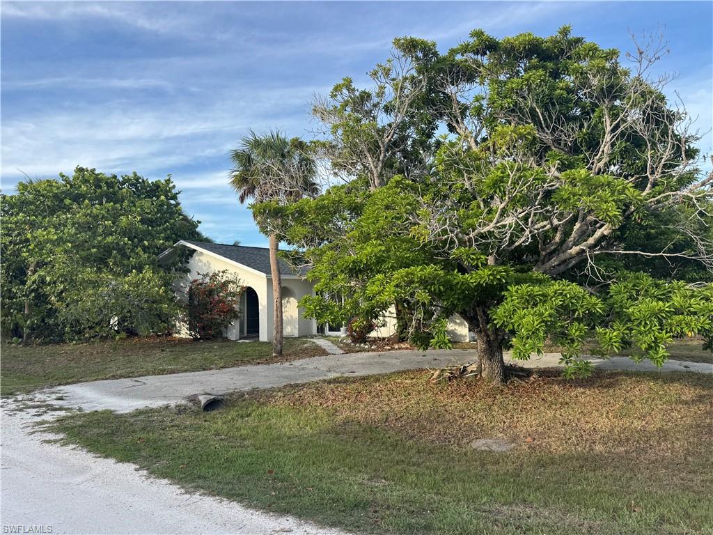 Exceptional opportunity to create your dream island retreat in one of Sanibel's most desirable locations! Situated on a spacious corner lot at 1683 Atlanta Plaza Drive, this 3-bedroom, 2-bath home is just a short walk or bike ride from Sanibel's world-famous shell-strewn beaches, charming boutiques, local restaurants, and vibrant shopping destinations.

Major restoration and infrastructure improvements have already been completed, providing tremendous value and peace of mind for the next owner. Recent upgrades include a new roof, impact-resistant windows and doors, new HVAC system, all-new electrical wiring and panel, new PEX plumbing throughout, and a tankless water heater. Storm mitigation has been completed, and drywall and insulation have been professionally removed approximately 3-4 feet throughout the home, creating a clean slate ready for your custom finishes and personal design vision.

Sanibel Island is renowned for its pristine white-sand beaches, breathtaking sunsets, abundant wildlife, and laid-back coastal lifestyle. Whether you're searching for a primary residence, seasonal getaway, or investment opportunity, this property offers the rare chance to complete a home exactly to your tastes while enjoying one of Southwest Florida's most sought-after island communities.

Bring your imagination and transform this property into the perfect Sanibel sanctuary just moments from the beach, restaurants, shops, and everything island living has to offer.