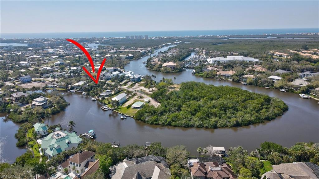 Fantastic location at picturesque bend in the wide section of the Imperial river, very deep water and seawall. Rare property with three residences. TFC2 zoning -amazing opportunity. Property experienced water damage, could be restored if brought to current code or lot cleared for new construction and is being priced at lot value.