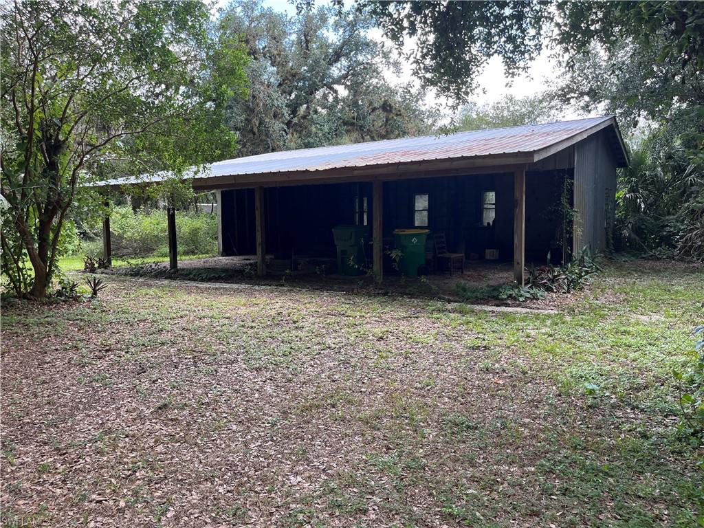 1.27 Acres of Prime commercial opportunity with a 1414 sq ft Building/Structure that could be converted to an office, plus a Pole Barn and a shed with electric. The parcel is at the corner of E. Hickpochee Avenue (SR 80) and S. Oak Street in the heart of LaBelle, FL.   State Road/Hwy 80 is the major East/west road traveled between Ft Myers and Clewiston. Lake Okeechobee and Palm Beach County. Zoned B-2 (Business General) with a Commercial future land use designation, this property offers excellent flexibility for retail, office, or a wide range of commercial uses.  The corner parcel that is .85 Acres is improved with structures; the adjoining parcel of .43 Acres is unimproved/cleared/vacant. Corner lot visibility, city utilities available, and located in a growing community — ideal for an investor, developer, or owner-operator looking to establish a presence in Hendry County’s county seat.  Perfect for Retail establishments, Restaurants, Office & Professional Services, Medical or dental offices, financial institution, Personal Services, or Other Commercial Buildings. Nearby businesses include McDonald’s, Subway, Taco Bell, 7-Eleven, Dollar General Market, Dunkin’, Dollar Tree, Goodwill, Suncoast Credit Union, Beef ‘O’ Brady’s and Aldi's coming soon.  See City Planning documents, Traffic Map reports, and Tapestry Profiles, etc. attached.  
Parcel Strap numbers 2 29 43 01 010 0049-012.0 and 2 29 43 01 010 0049-011.0