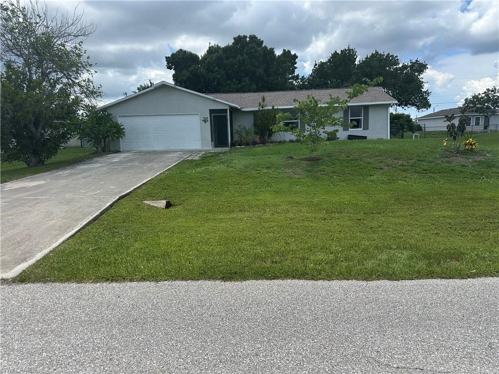 Move-in ready 3-bedroom, 2-bath situated on an oversized double lot in a convenient Northeast Cape Coral location. This well-maintained home features a desirable single-story floor plan with a 2-car attached garage, tile flooring throughout, and no carpet. Recent updates include a new roof, well, siding, and exterior paint in 2022, complete re-piping in May 2024, and fresh interior paint in 2026, offering peace of mind for years to come.

The spacious backyard provides plenty of room for a future pool, entertaining, or simply enjoying Florida living. Garden enthusiasts will appreciate the established tropical landscape featuring papaya trees, dragon fruit, passion fruit, Barbados cherry, banana trees, Cuban oregano, spinach, and ornamental landscaping.

Conveniently located near Diplomat Elementary and Diplomat Middle School, shopping, dining, parks, and everyday conveniences with easy access to Pine Island Road, Del Prado Boulevard, and US-41.

Whether you're looking for a primary residence, seasonal home, or investment property, this home offers an excellent combination of updates, outdoor space, and location. Schedule your private showing today.